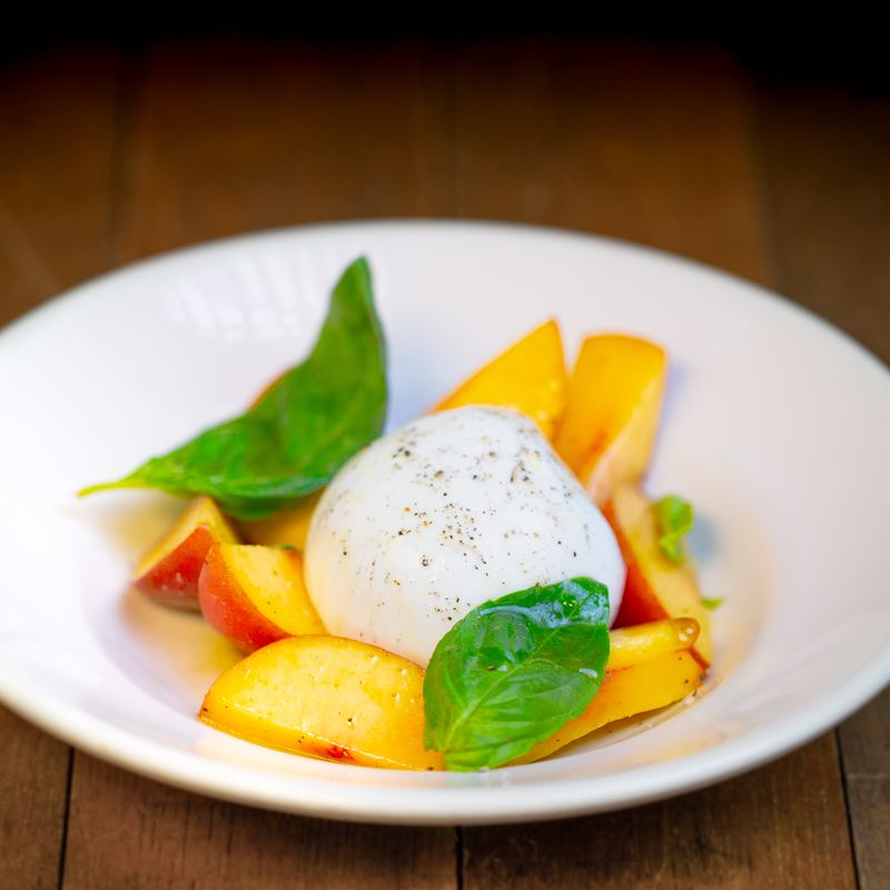 Burrata with peach and basil