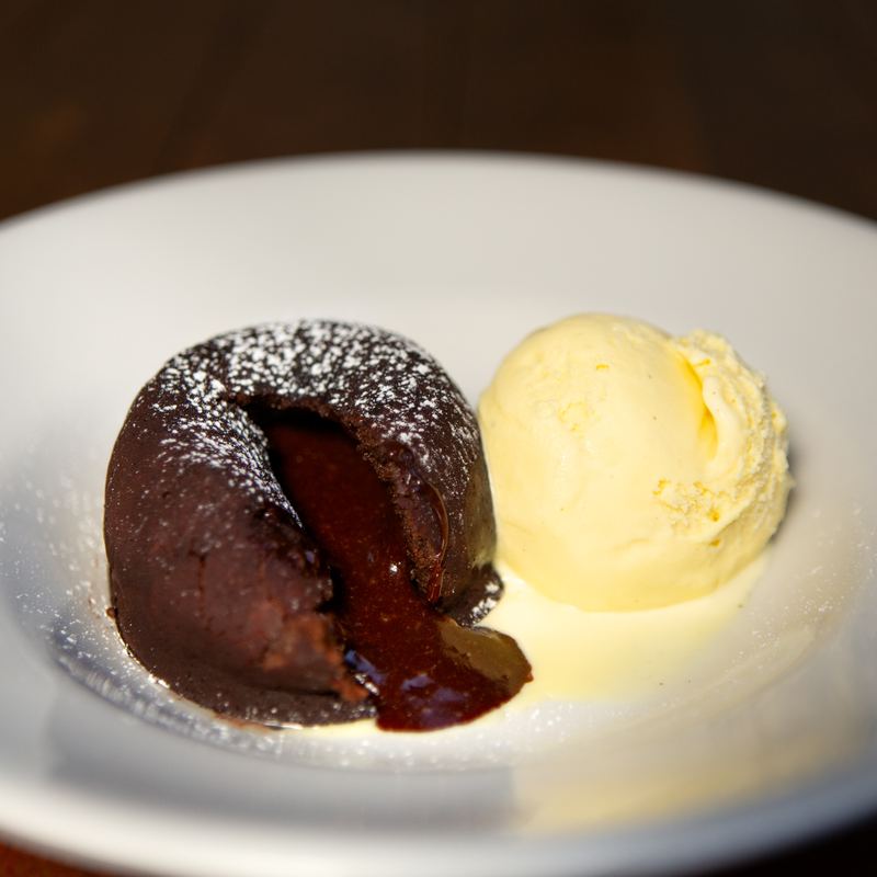 Chocolate fondant with a scoop of vanilla ice cream