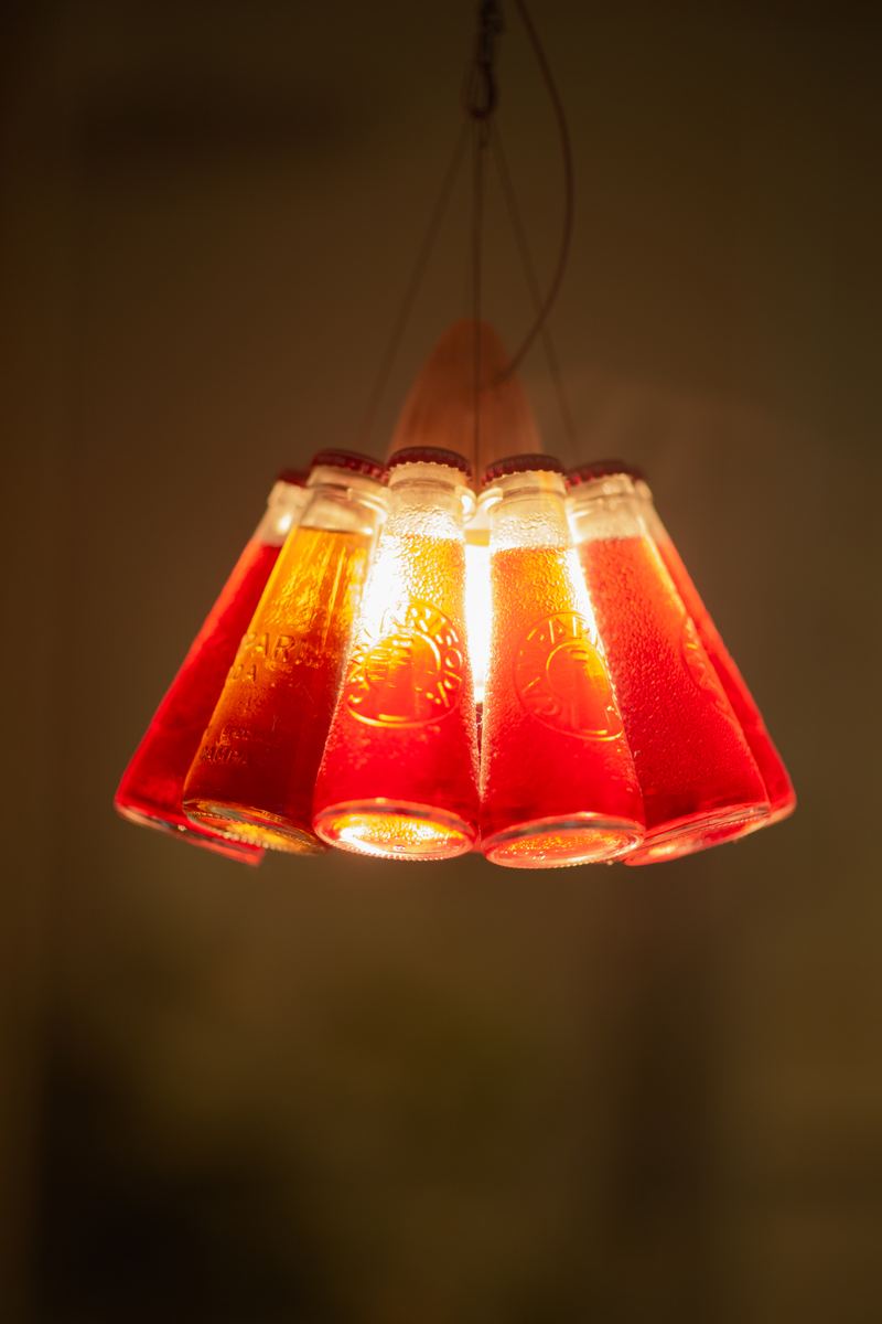 Red glass pendant lamp glowing in the restaurant